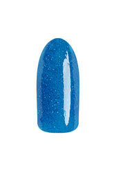 Glossy blue glitter nail swatch featuring TruLAQ What are the Odds? Extended Wear lacquer for a sparkling finish.